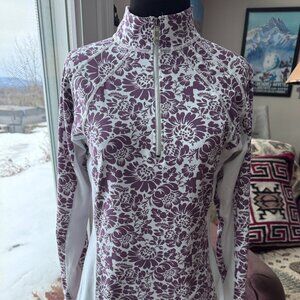 Polarmax 1/4 zip top. White and Purple floral. Size Medium